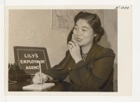 [recto] Mrs. Kimiko Nakanishi, from Topaz, has opened an employment agency, Lily's Employment Agency, 2033 Pine Street, San Francisco. ;  Photographer: Iwasaki, Hikaru ;  San Francisco, California.