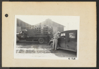 [recto] Poston, Ariz.--Site No. 1. Evacuees are brought in by car and truck from the train to this War Relocation Authority center. ;  Photographer: Clark, Fred ;  Poston, Arizona.