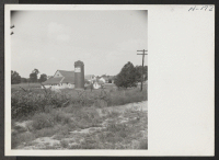 [recto] Type of Indiana farm land, showing barns and silo. This farm is west of Indianapolis. ;  Photographer: Mace, Charles E. ;  Indianapolis, Indiana.