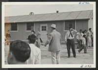 [recto] Picture of this center's air-raid alert, which took place May 23. ;  Photographer: McClelland, Joe ;  Amache, Colorado.