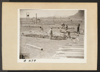 [recto] Tule Lake, Calif.--Construction begins on War Relocation Authority center for evacuees of Japanese ancestry near Tule Lake in Modoc County, California, south of the Oregon border. ;  Photographer: Albers, Clem ;  Newell, California.