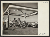 [recto] Two of the evacuees who participated in the wrestling tournament held at this center Thanksgiving day. ;  Photographer: Stewart, Francis ;  Rivers, Arizona.