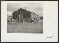 [recto] A view showing the artistic way in which the evacuees decorate the exterior of the barracks to make them more homelike. ;  Photographer: Stewart, Francis ;  Newell, California.