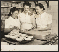 [recto] Miss Ruth Yakel, Mrs. Yukino Kawamura and Mrs. Cora Gilbert are shown at their work in the Nutrition Department of ...