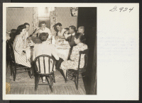[recto] Enjoying dinner in the Moriuchi home at Haddonfield, New Jersey are Miss Eleanor Moore, Washington WRA, Tak Moriuchi, Granada, Herb ...