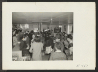 [recto] Interior of the cooperative canteen on a Saturday afternoon. ;  Photographer: Parker, Tom ;  Amache, Colorado.