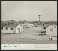 [recto] A section of the barrack type quarters provided at the Lomita Housing Project for returnees while they are locating permanent homes in the area. ;  Photographer: Parker, Tom ;  Lomita, California.