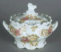 Sugar bowl with rose decoration with lid.
